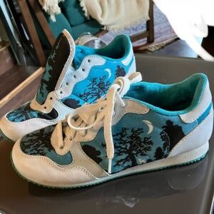 Vintage Kenzo Sneakers. Night Scene on Turquoise Background with White Leather
